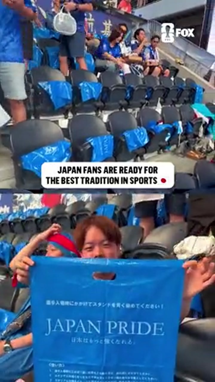 比赛还没结束，日本球迷已为清理垃圾做好准备